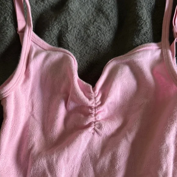 SKIMS LOGO POINTELLE ONESIE | BUBBLE
GUM - Picture 6 of 7